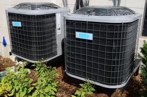 Two outdoor air conditioner units.
