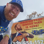 Local plumbing expert Jeremy Salzbrun of H&S Heating and Air Conditioning with his sign outside a Central Minnesota home.