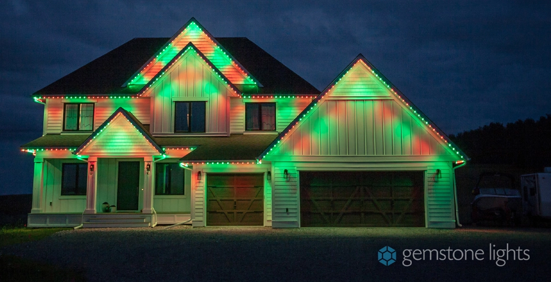 A home decorated for Christmas with red and green Gemstone Lights.