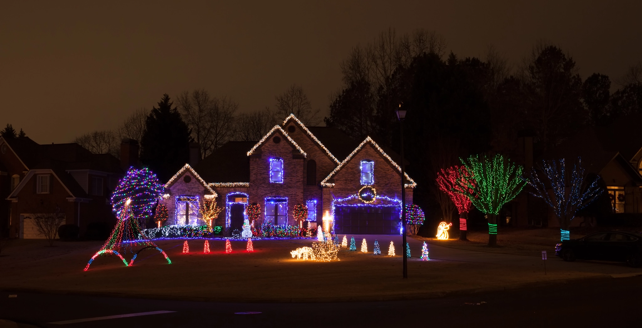 A house decorated with exterior Christmas lights.