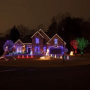 A house decorated with exterior Christmas lights.