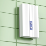 A tankless water heater mounted to the wall