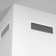 Two air conditioning vents on a wall.